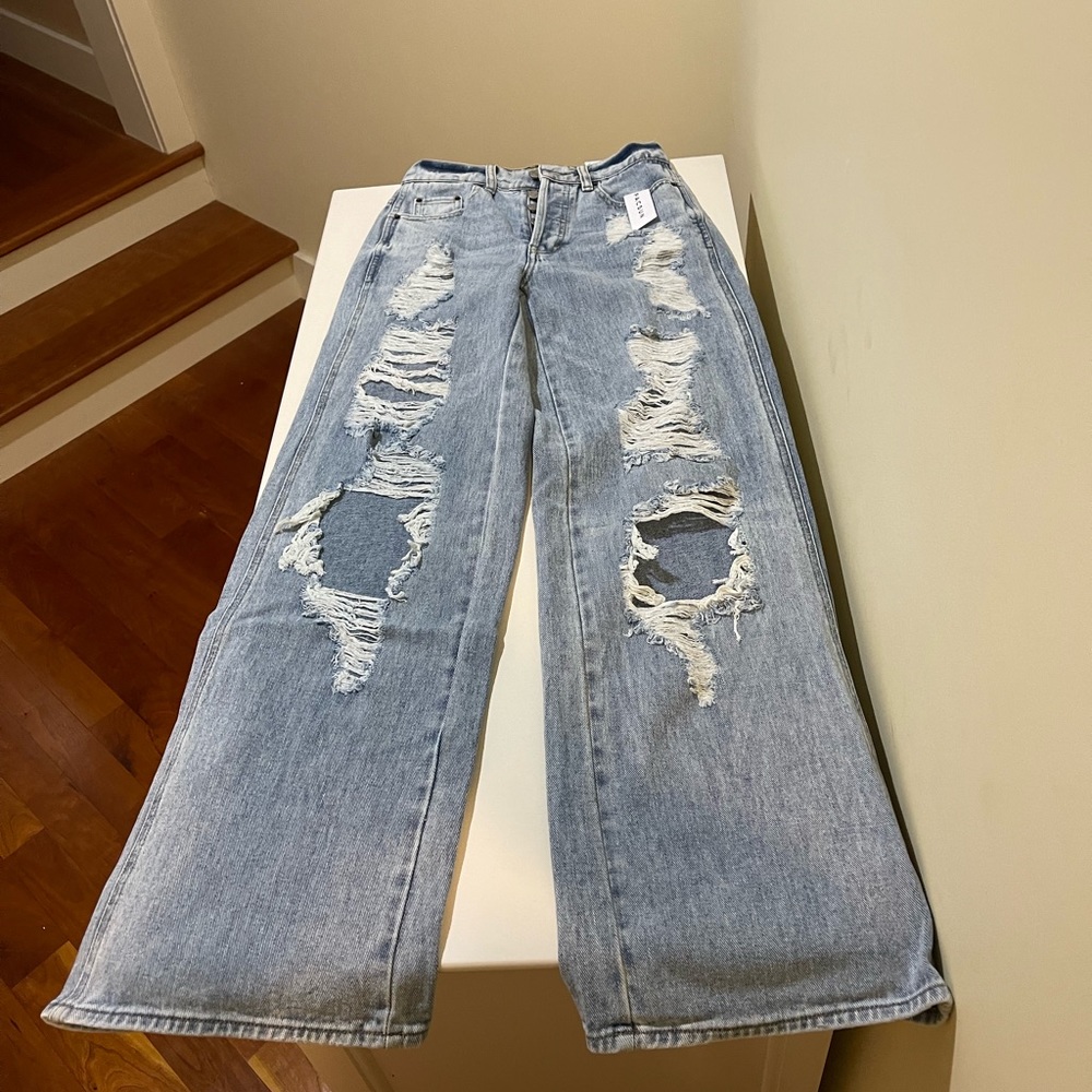 PacSun, baggy ripped jeans.